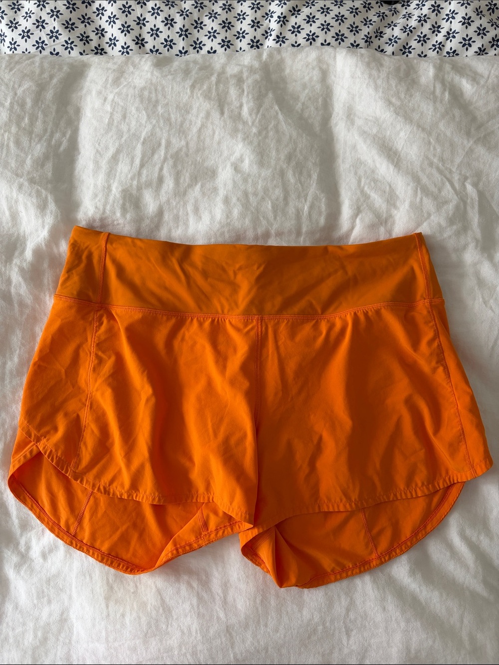 Orange lululemon 4 inch speed up shorts 14